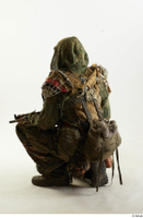  Photos John Hopkins Army Postapocalyptic Suit Poses kneeling whole body 0004.jpg